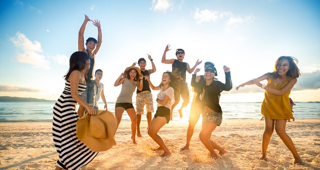 Happy young people on beach